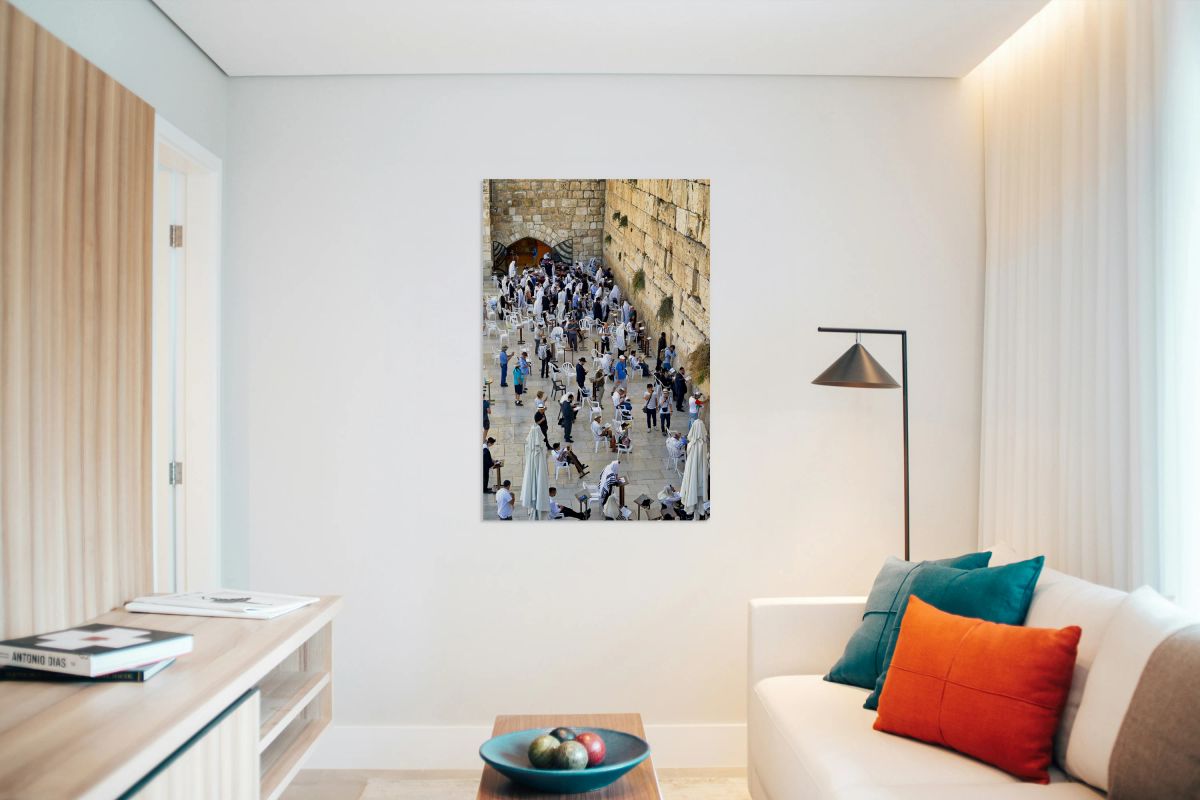 Visitors pray at the western wall in Jerusalem during the day
