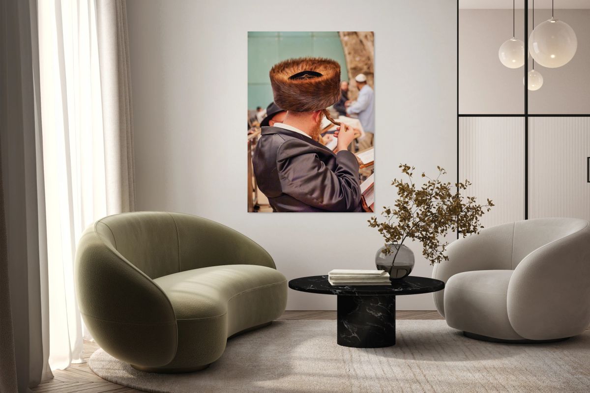 Orthodox Jews pray and read at the Wailing Wall in Jerusalem