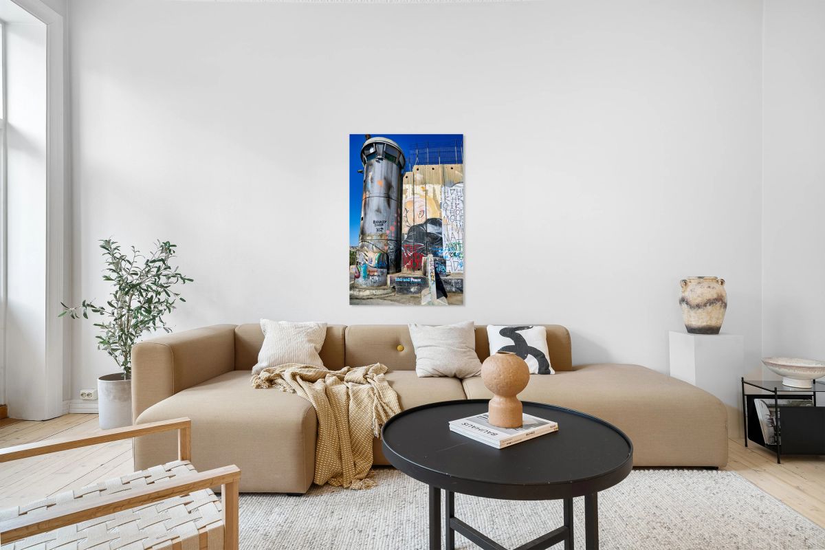 West Bank separation wall in Bethlehem shows street art and towe