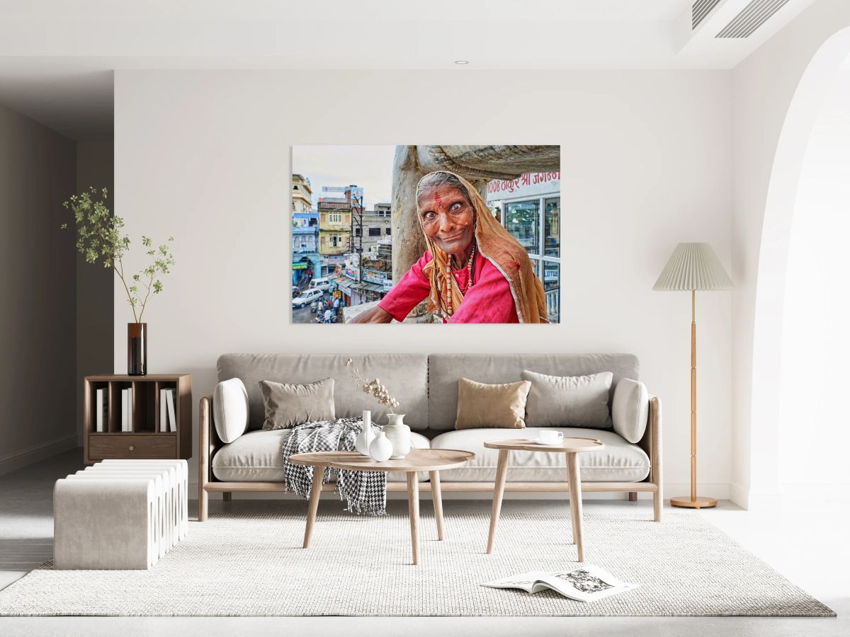 Woman poses for a picture on a balcony in Udaipur Rajasthan