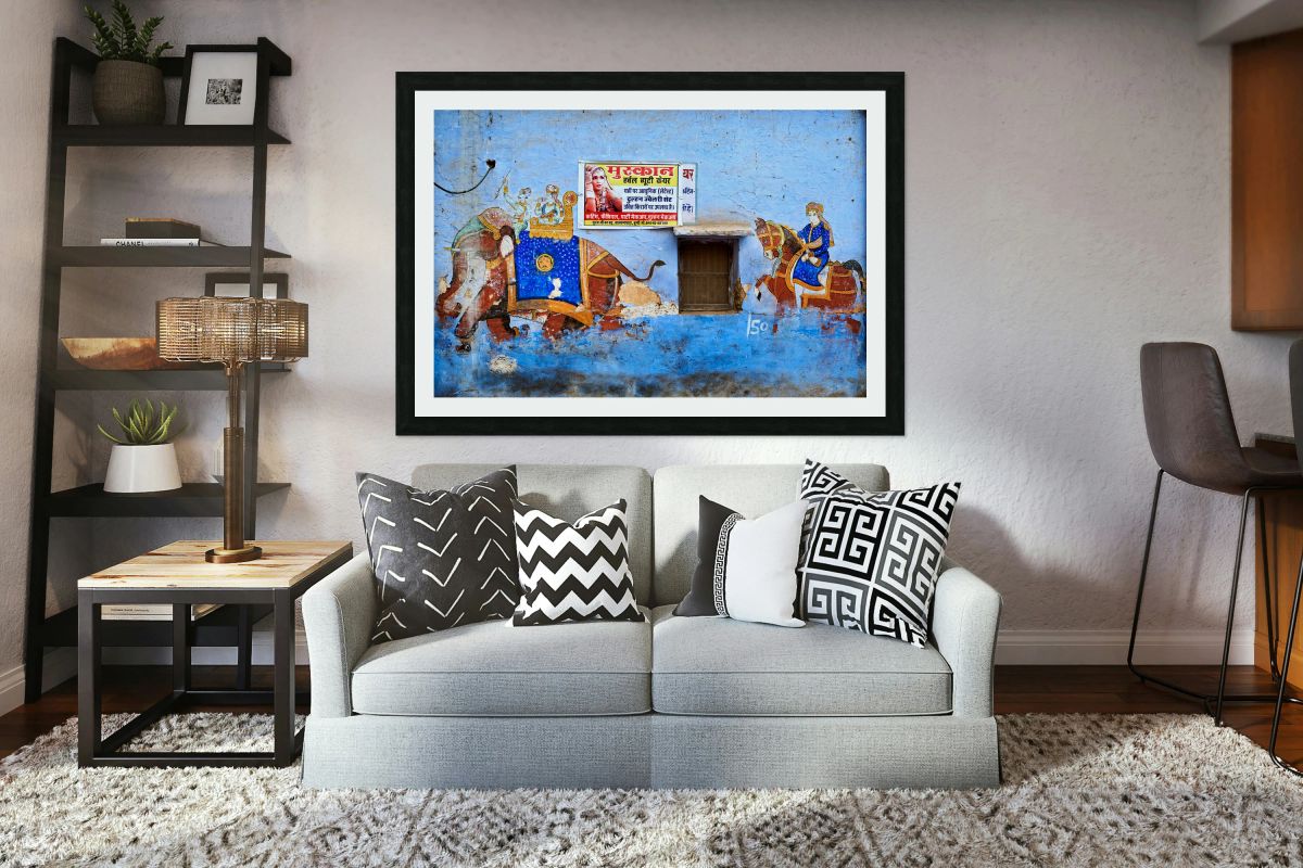 A painted house in Bundi displays vibrant art of elephants and r