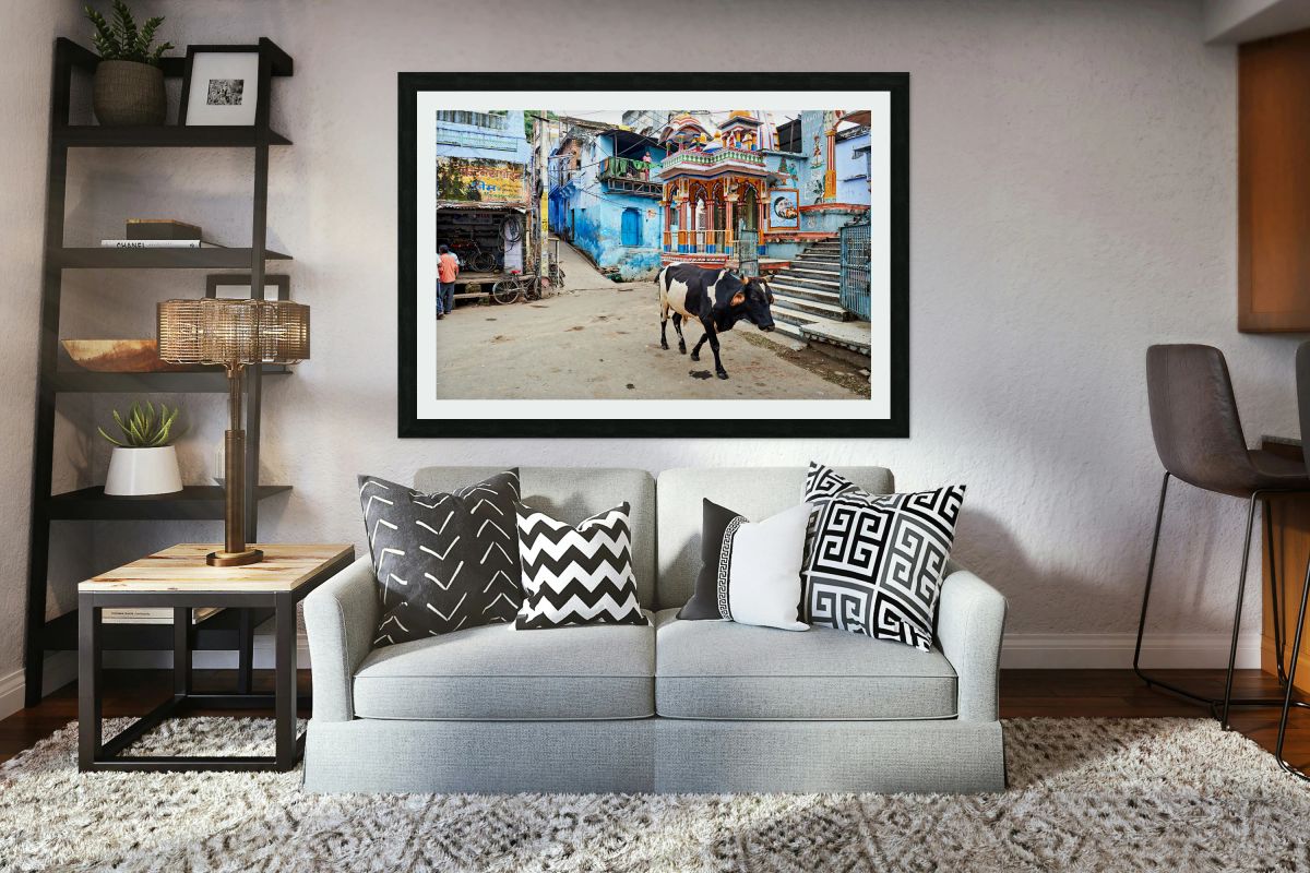 Decorated painted house in Bundi Rajasthan with a cow walking