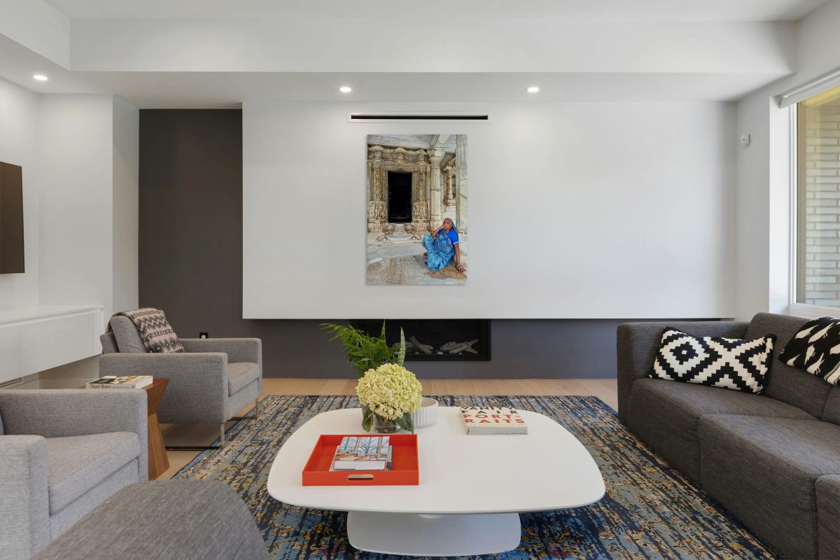 Old Jain temples in Ranakpur Rajasthan with a woman resting