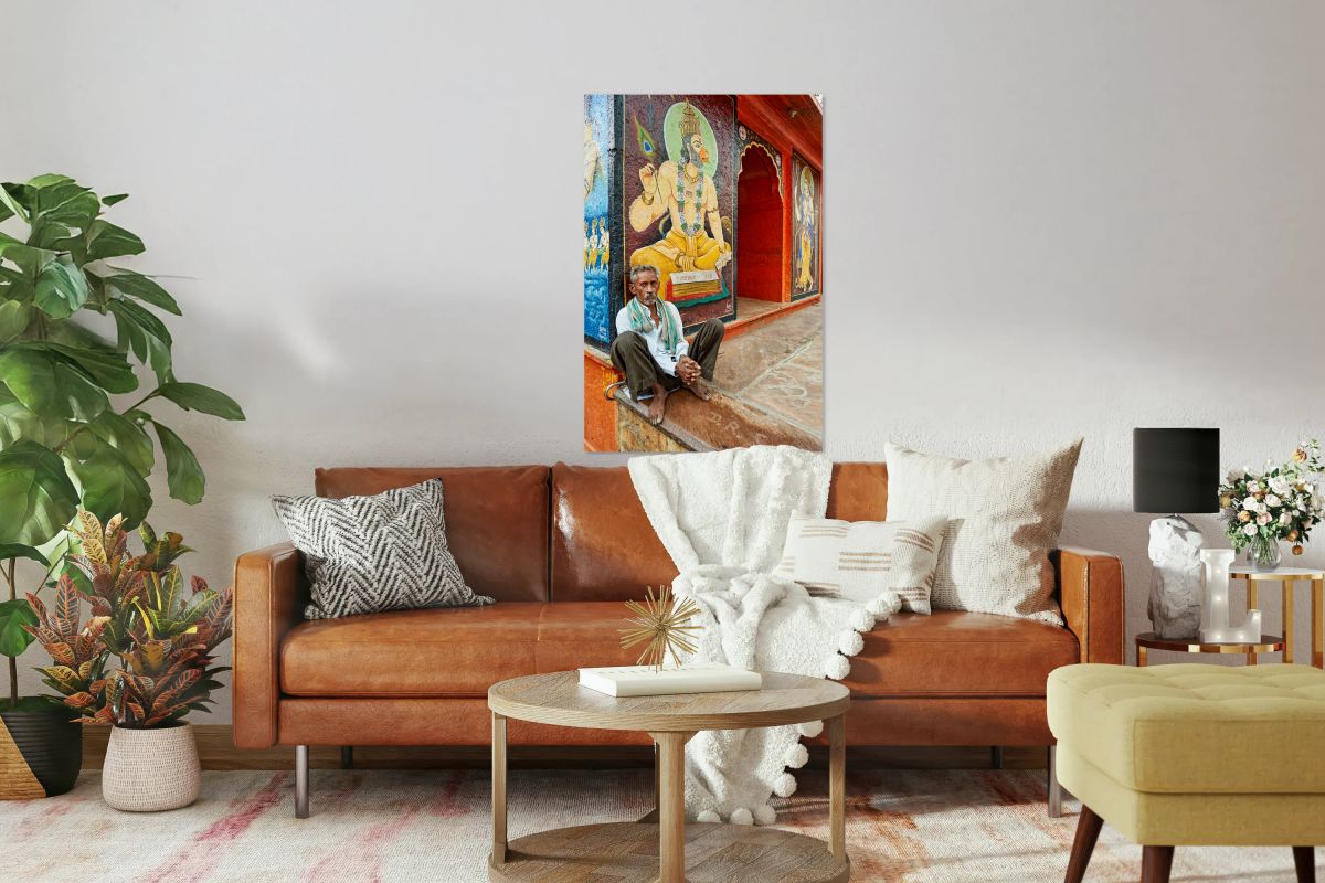 Old man sitting in Bundi Rajasthan near wall paintings