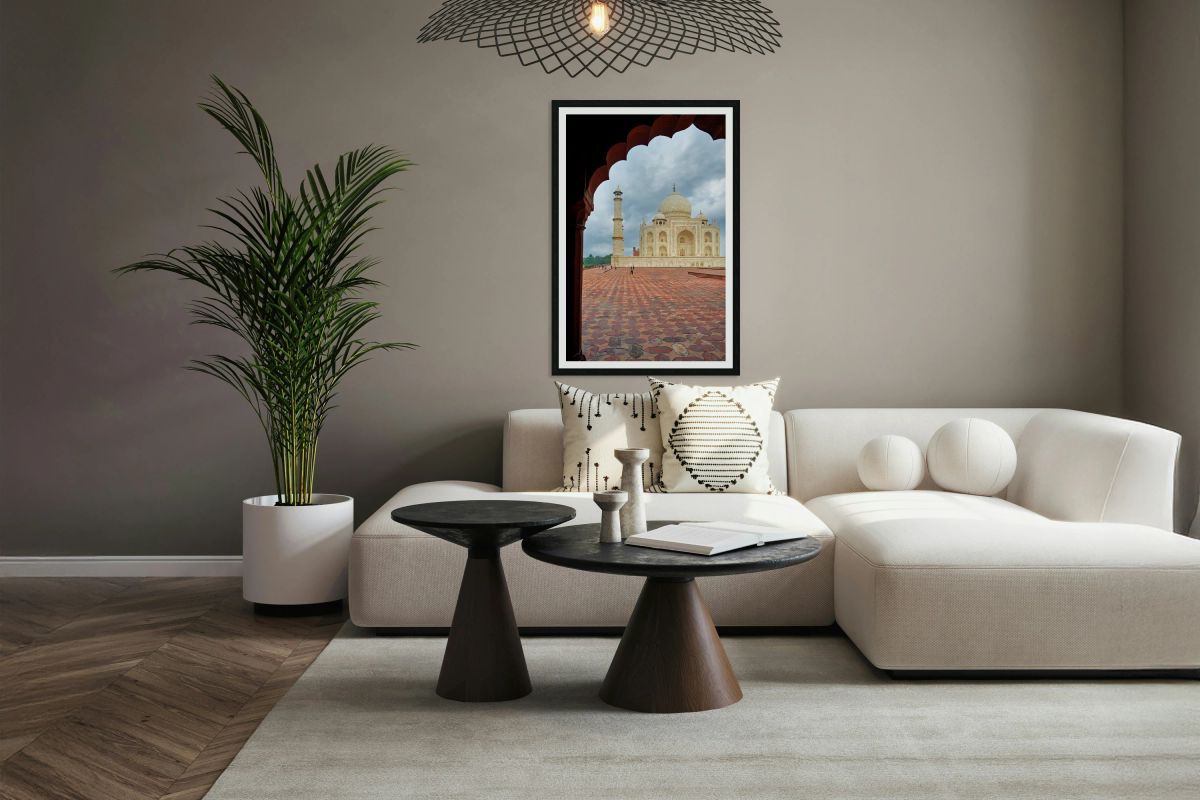 Exploring the view of Taj Mahal from an archway in Agra