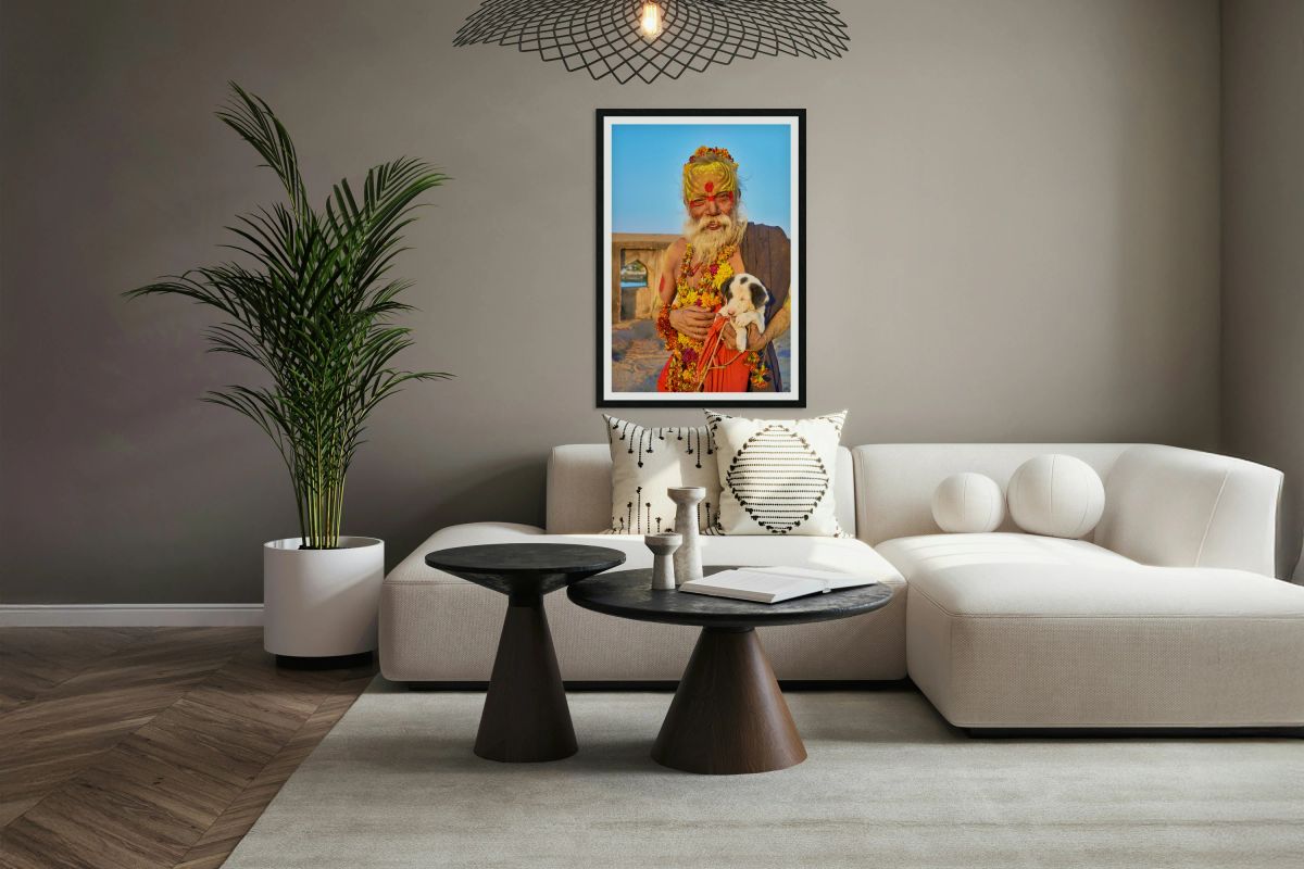 Holy man with puppy in Orchha Madhya Pradesh India