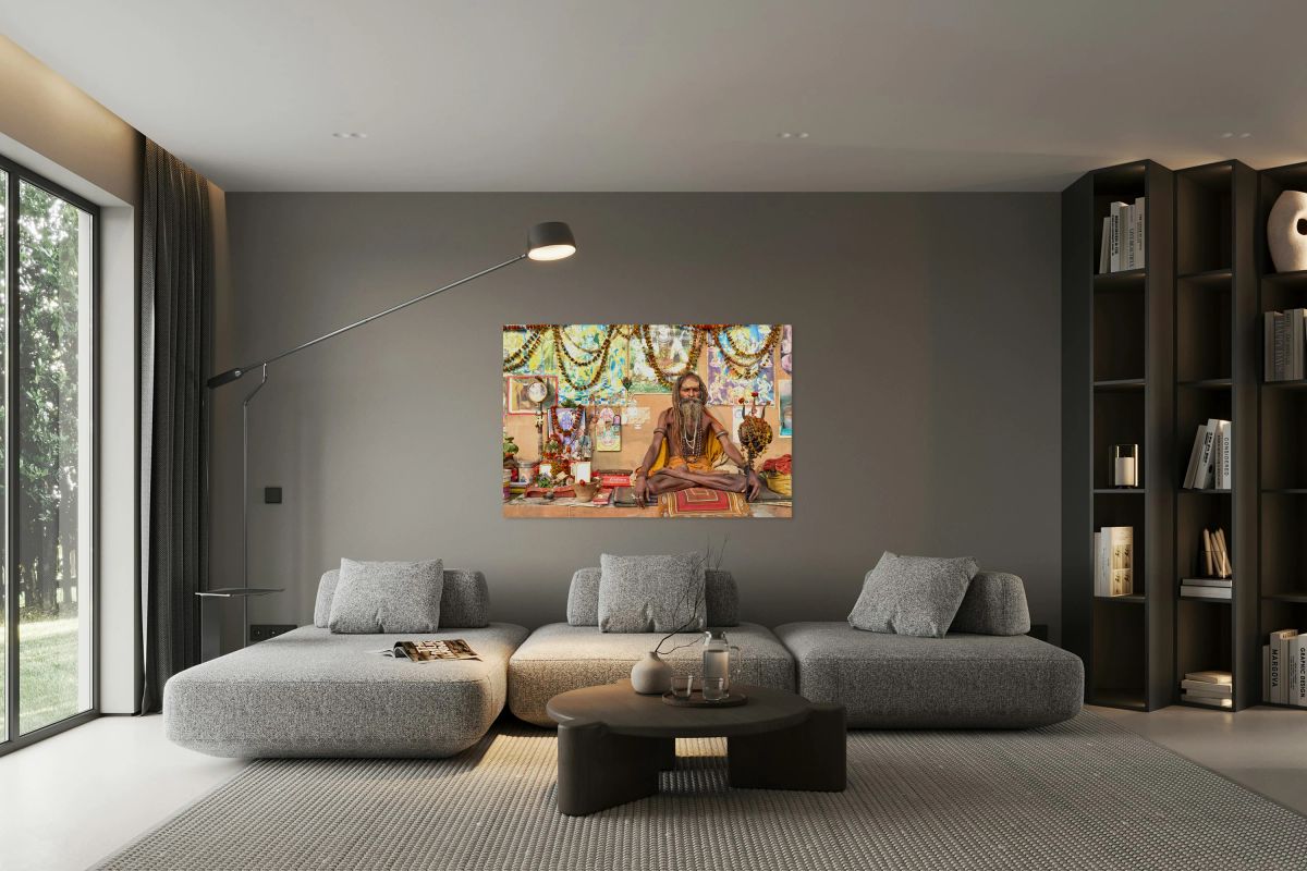 Sadhu sitting in Varanasi with offerings and religious symbols