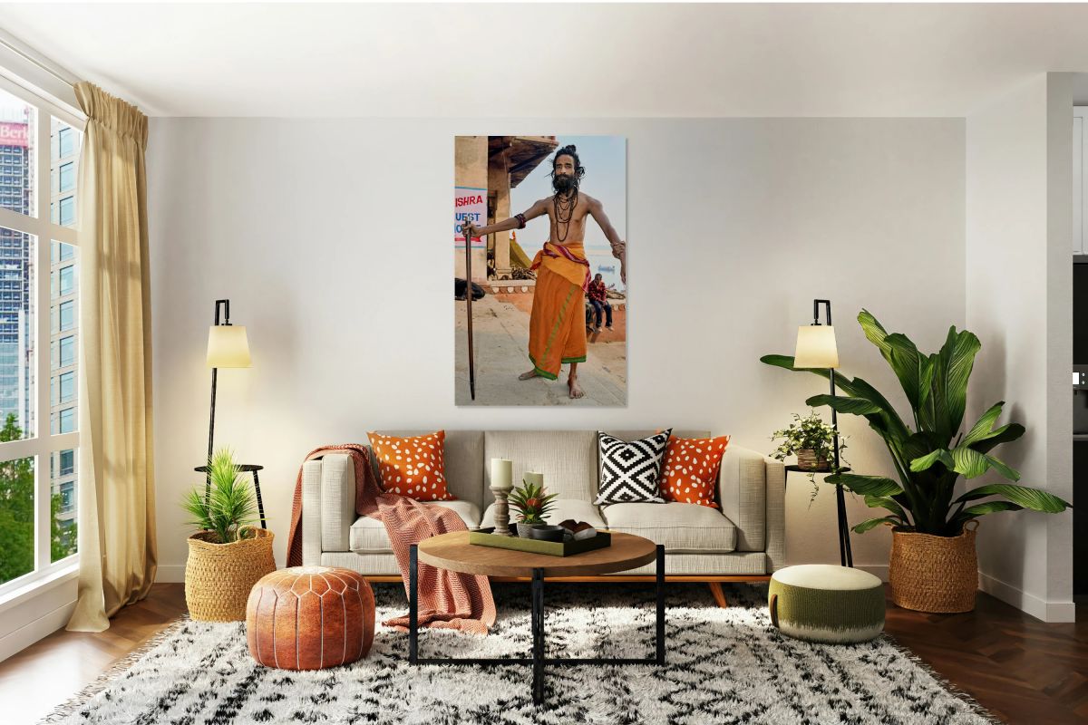 Sadhu stands near the Ganges River in Varanasi India