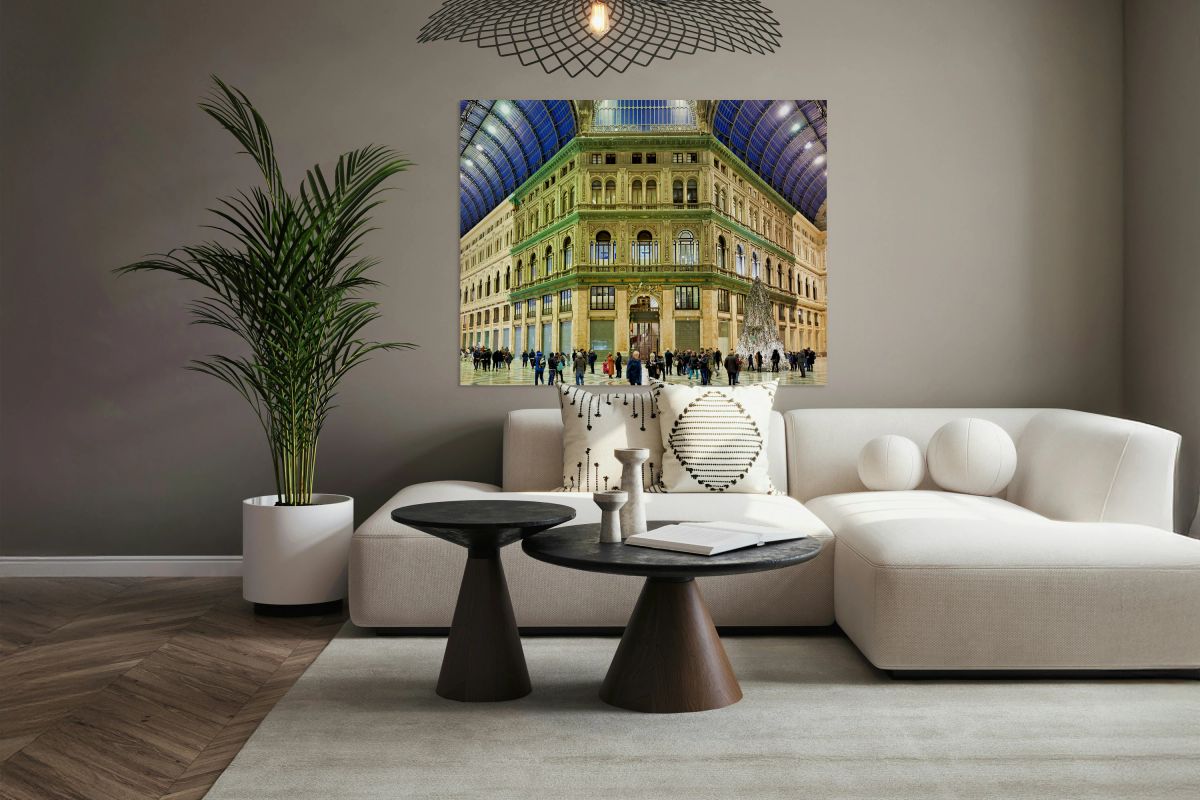 Visitors explore Galleria Umberto I in Naples during a busy day
