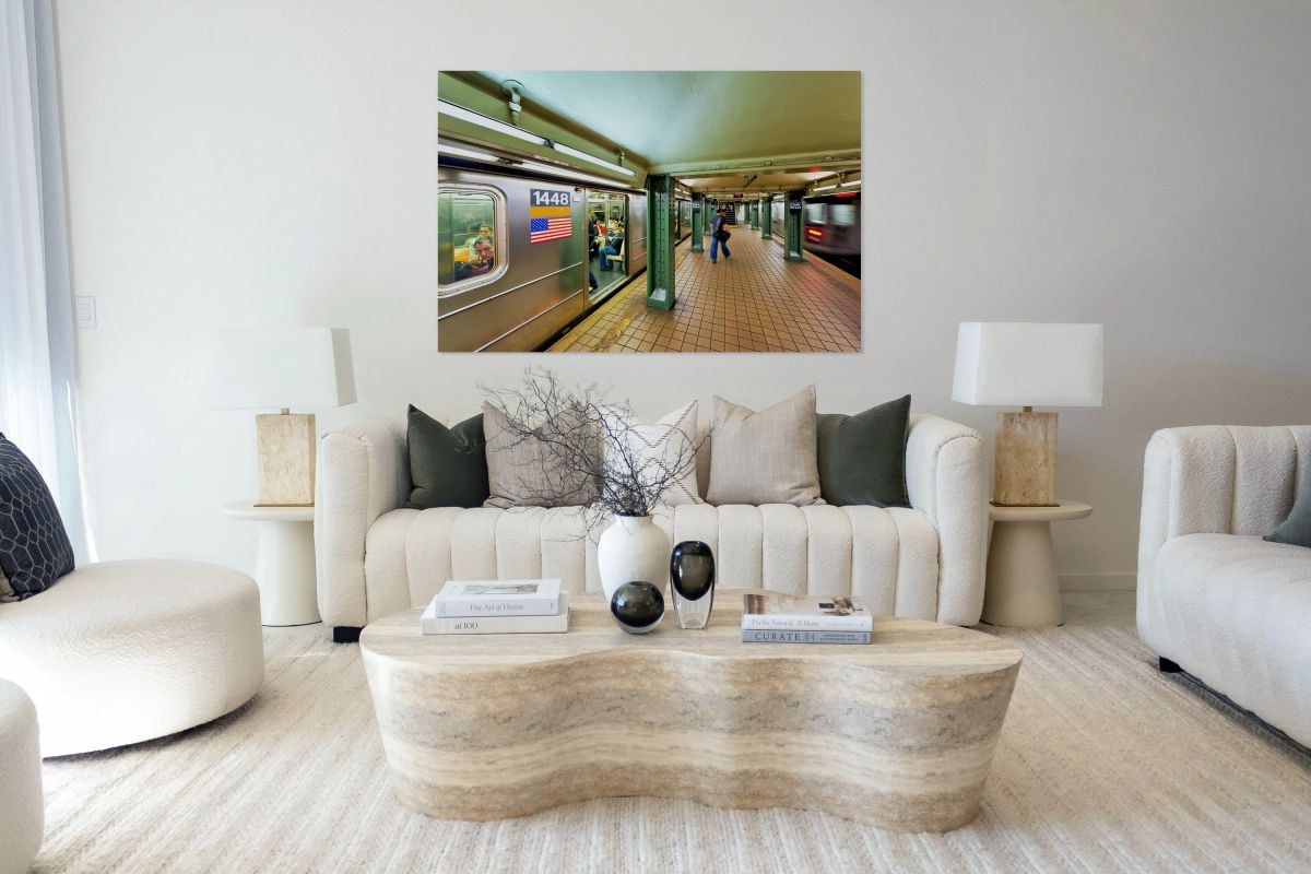 People wait at Manhattan subway station in New York City