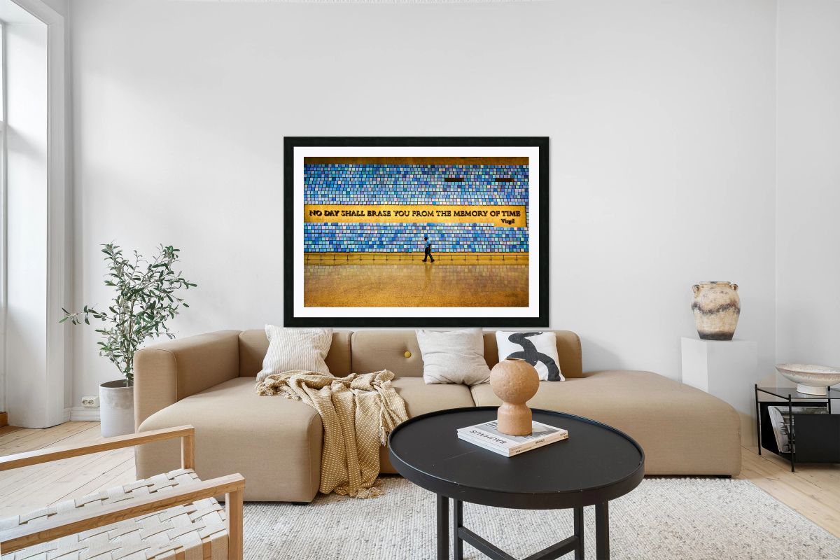 Visitors walk by art display at National September 11 Memorial M