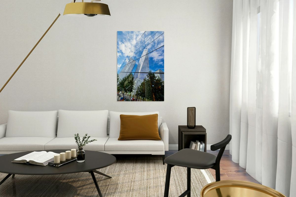 Reflection of One World Trade Center and buildings in Manhattan