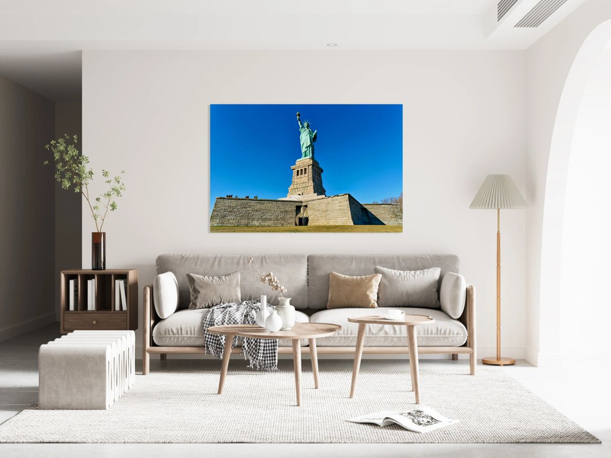 Statue of Liberty stands tall on Liberty Island in Manhattan