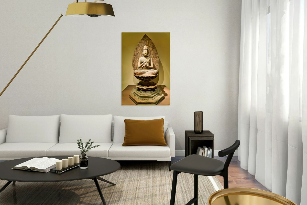 Sculpture of buddha in asian art gallery in metropolitan museum 