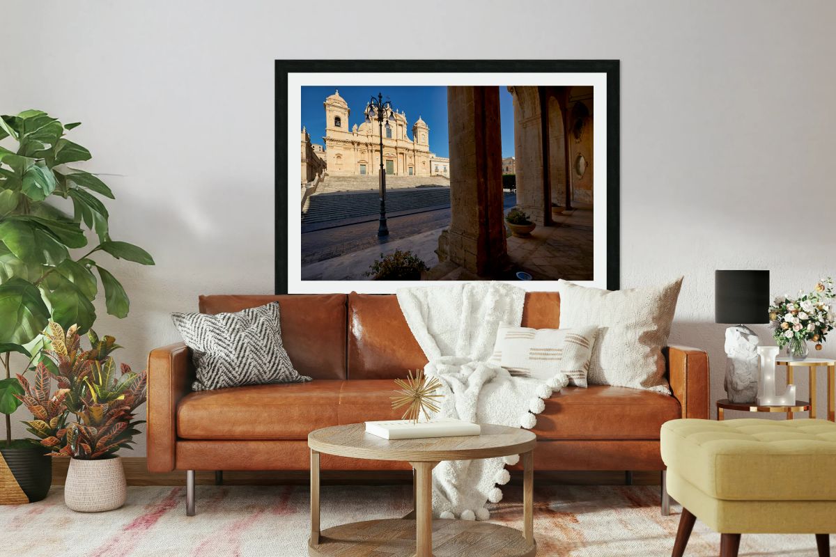 Noto Cathedral stands tall in Sicily under a clear blue sky