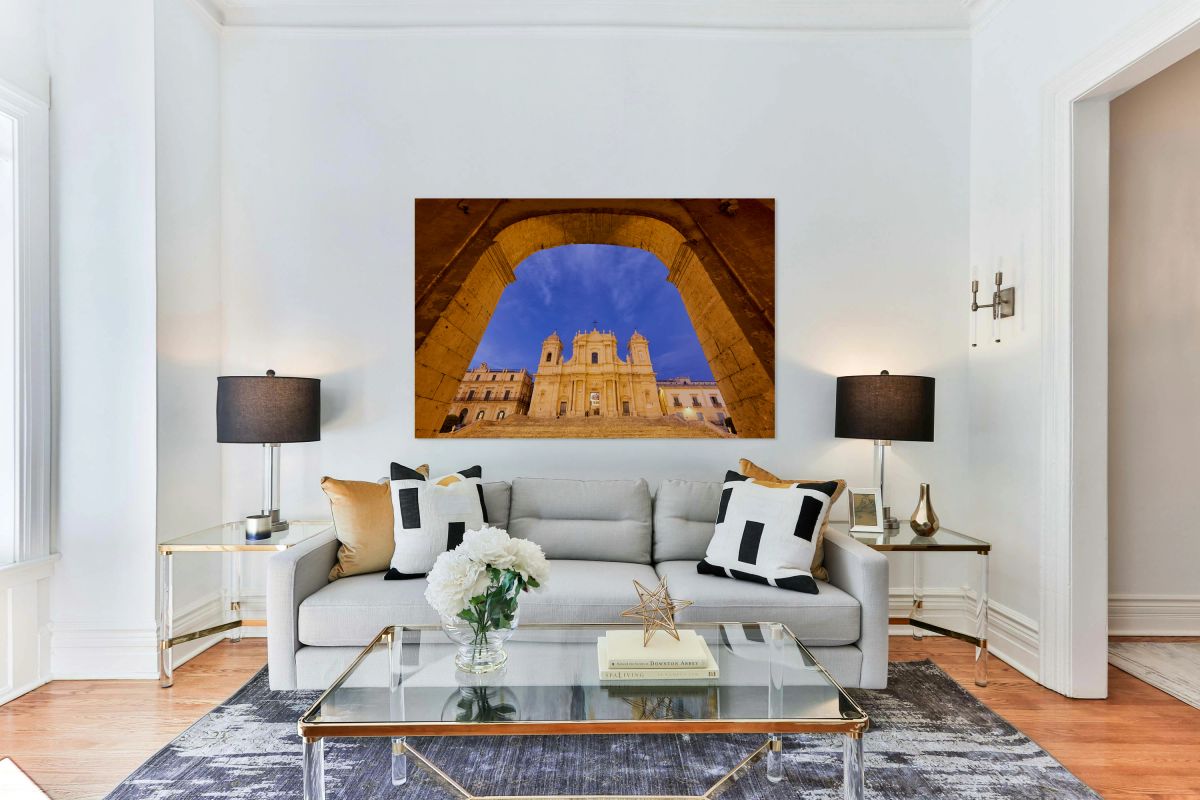 Noto Cathedral in Sicily at dusk under a colorful sky