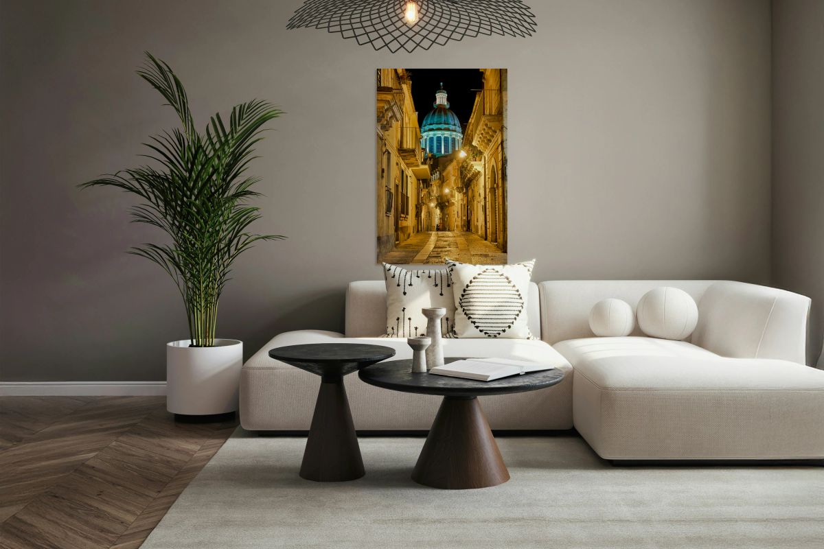 Duomo of San Giorgio shines at night in Modica Sicily Italy