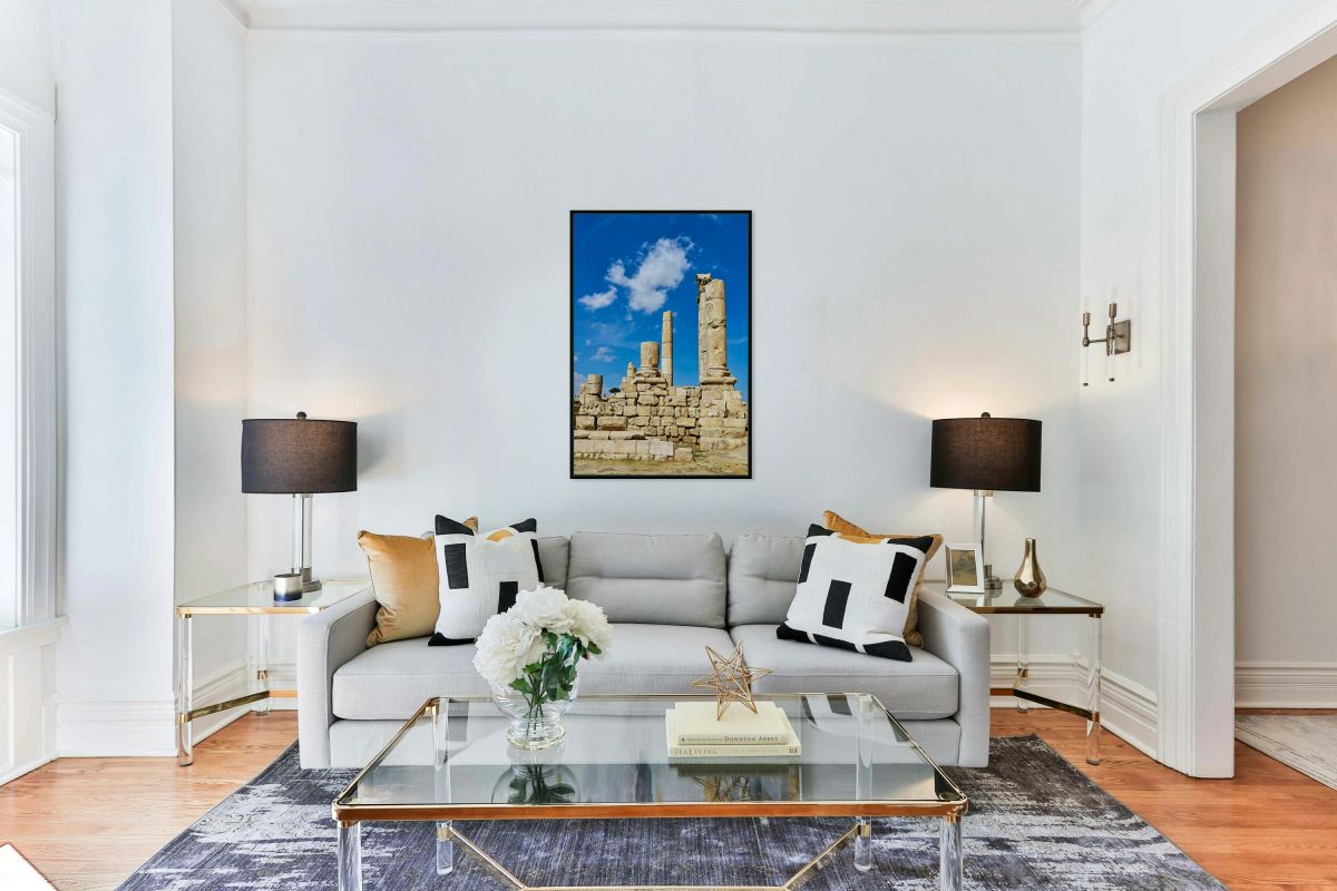 Exploring ancient ruins at Citadel in Amman Jordan under blue sk