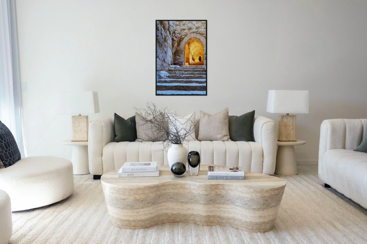 A person walks up stone stairs inside Ajloun castle in Jordan