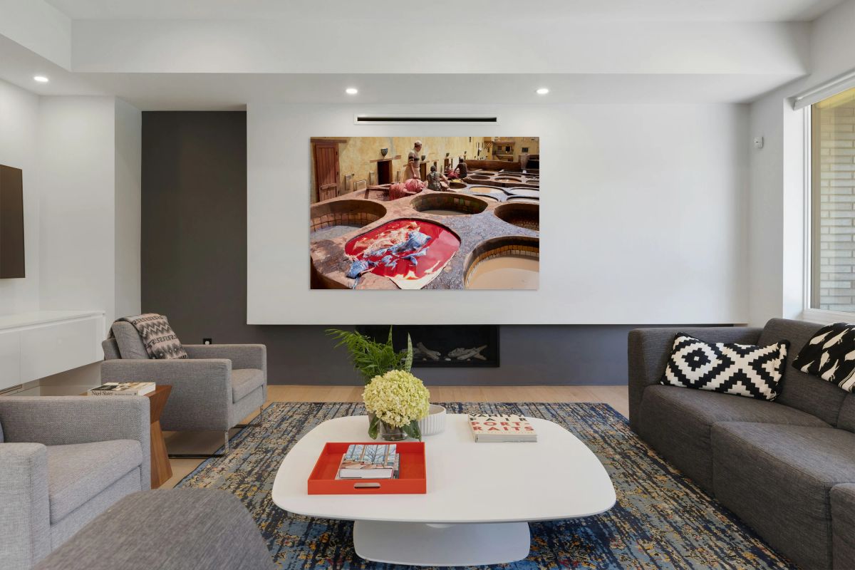 Workers dyeing leather at Chouara Tannery in Fez Morocco