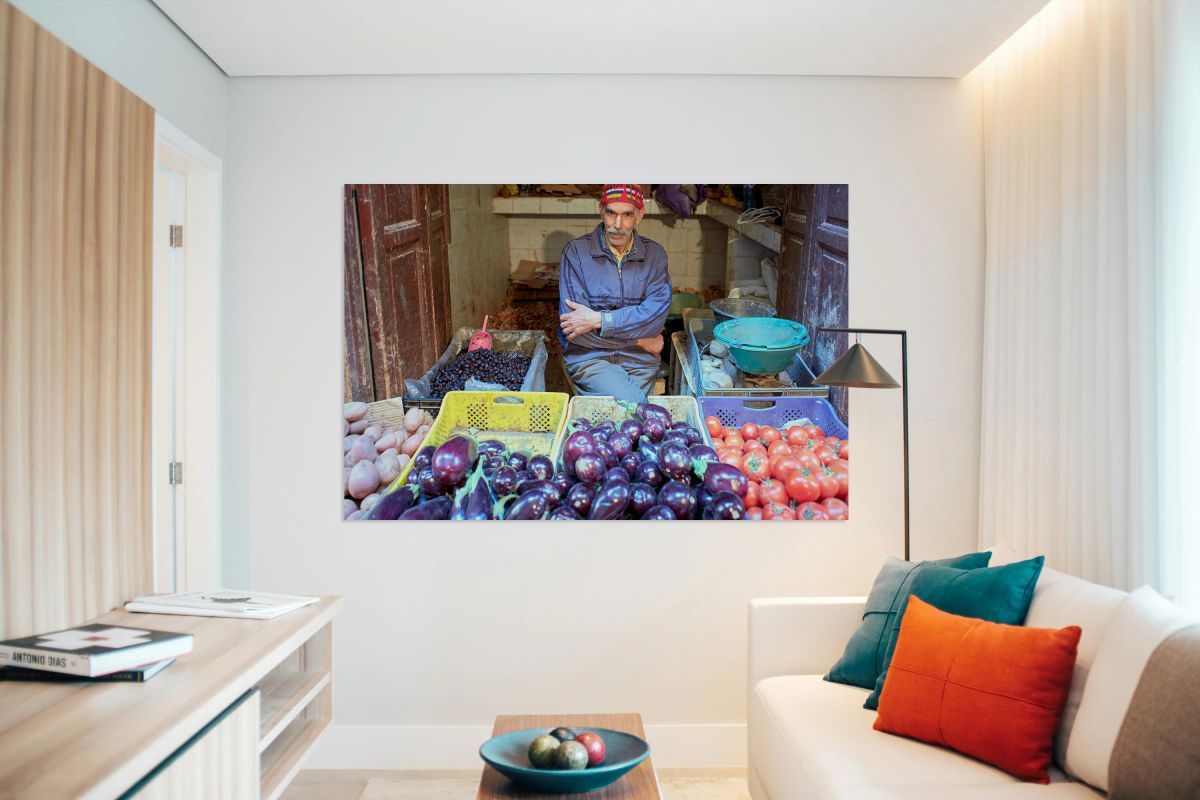 Greengrocer selling vegetables in Fez Morocco during the day