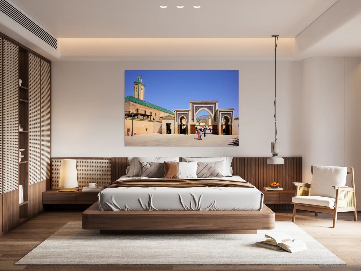 Visitors walk through Bab Rcif gate in Fez Morocco during the d