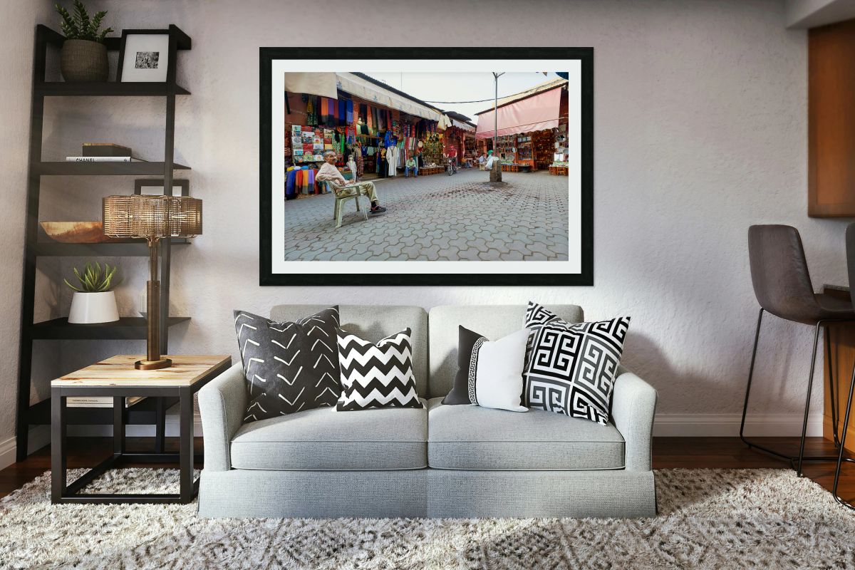 Shops in the Medina of Marrakesh with people and goods on displa