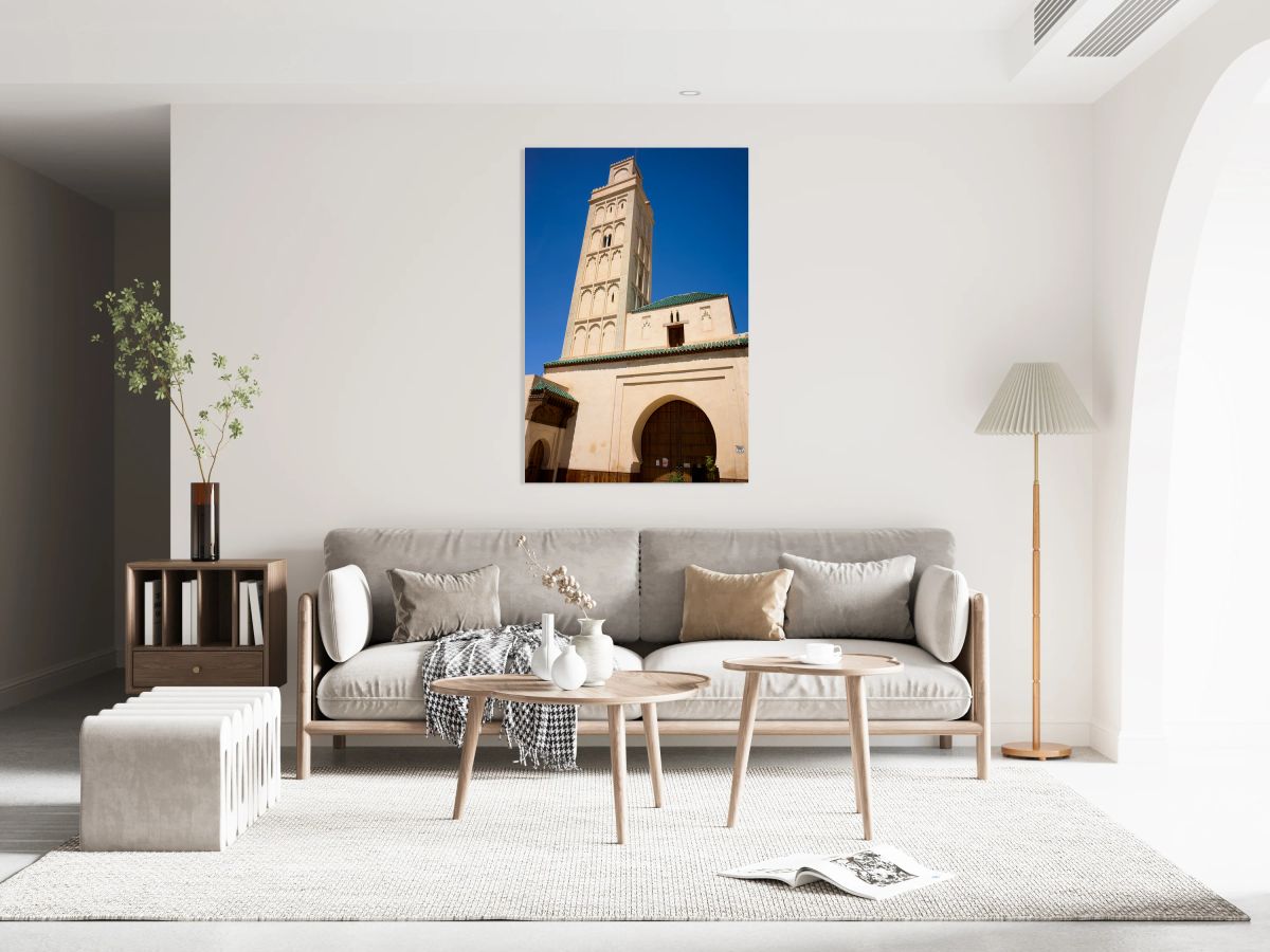 Visit Meknes mosque in Morocco with a tall tower and clear sky