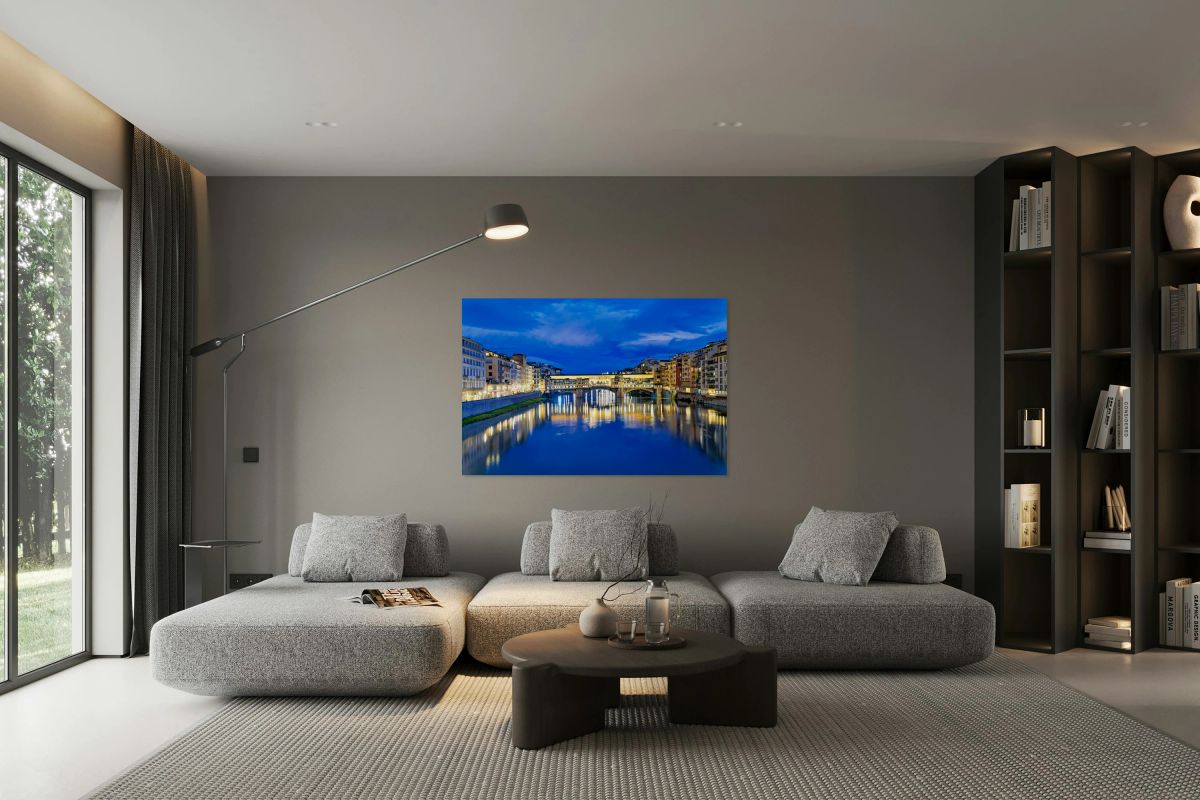 Ponte Vecchio bridge over the Arno river in Florence at night