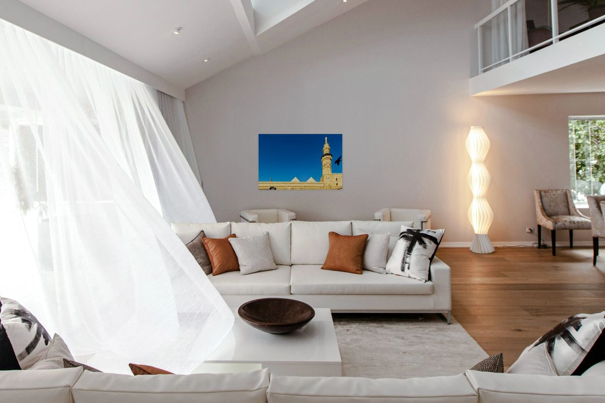 Mosque tower in Damascus against clear blue sky