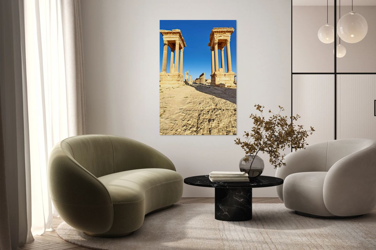 Exploring Palmyras ancient tetrapylon in Syria at noon