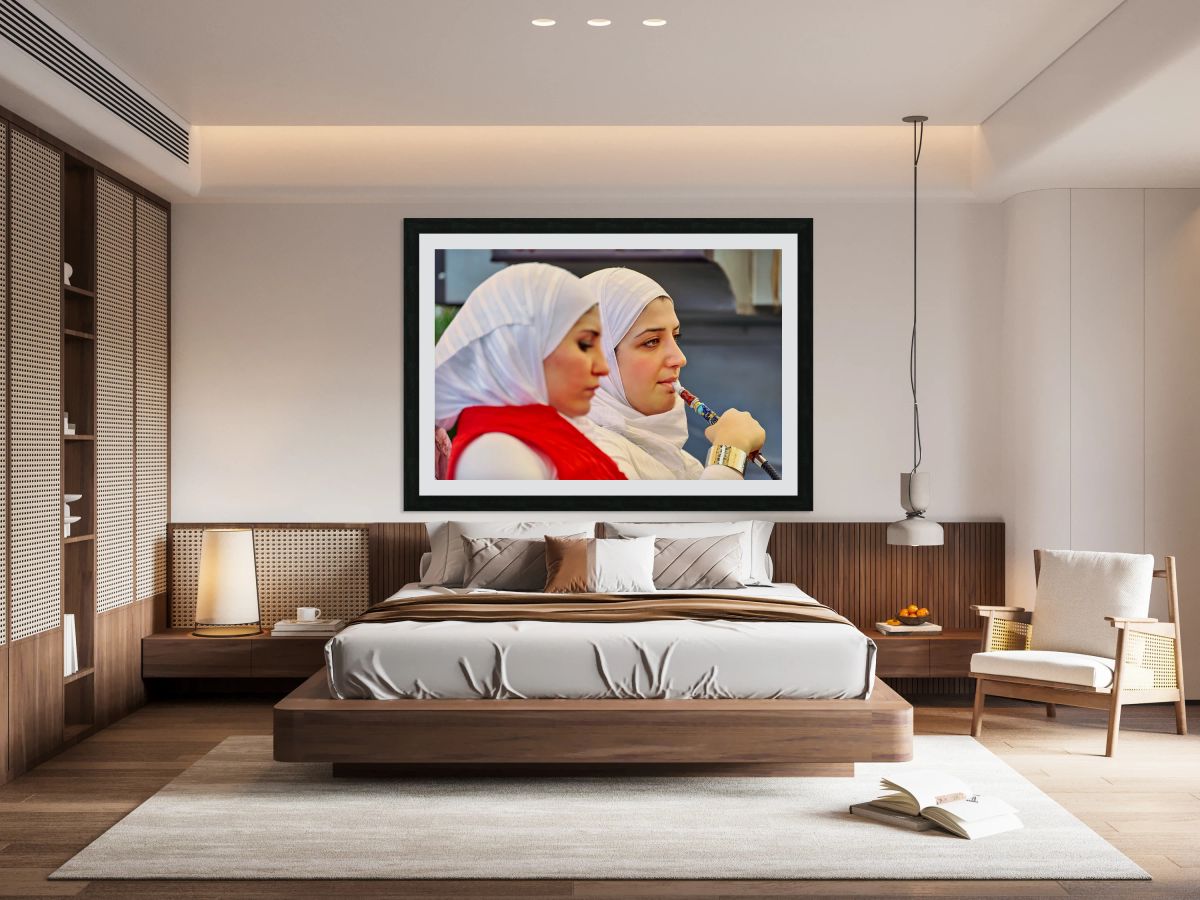 Young woman smokes hookah in Aleppo Syria