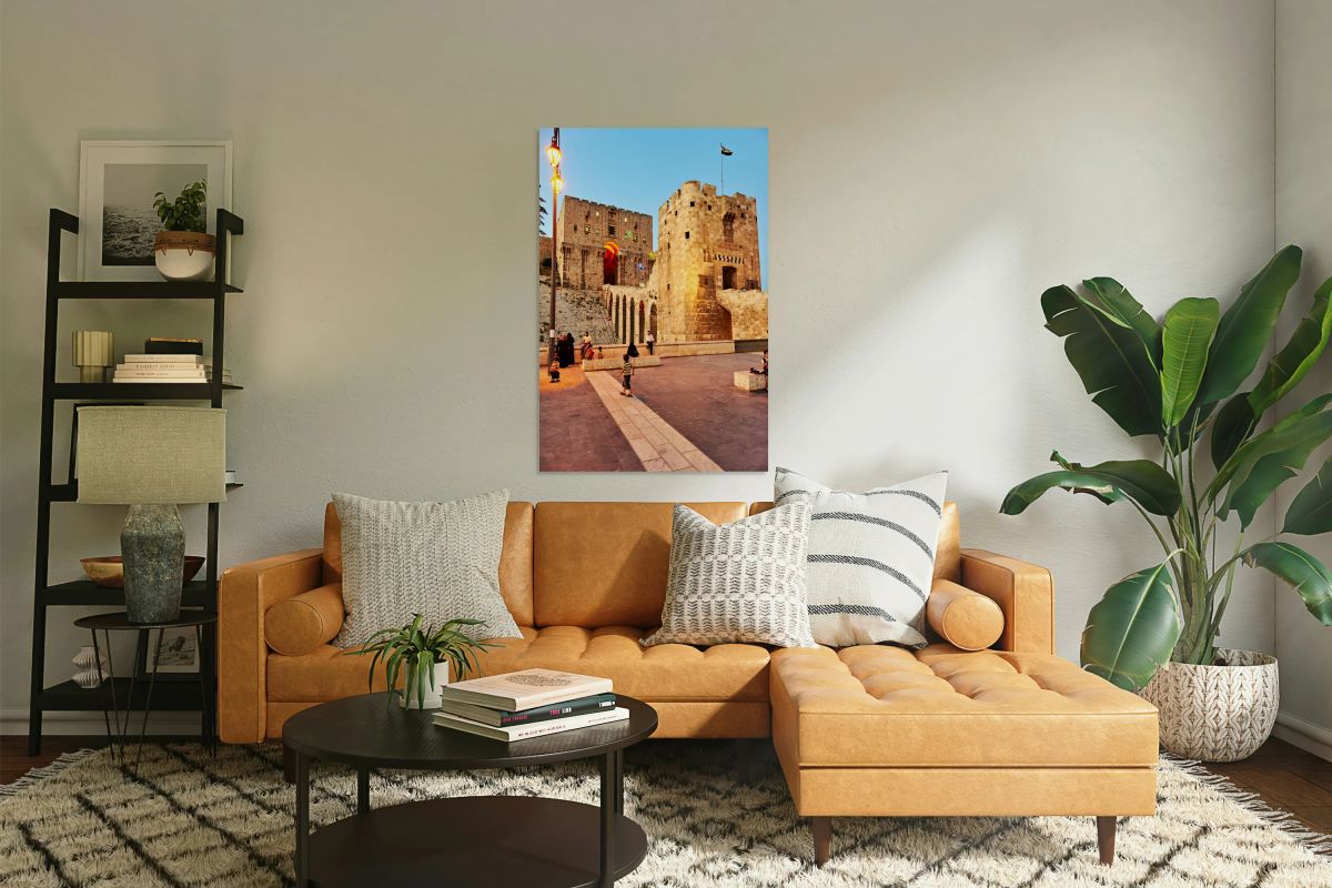 Citadel of Aleppo in Syria with people walking and playing