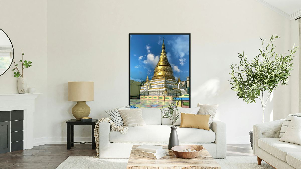 Golden stupa at Sagaing Paya in Myanmar under blue sky