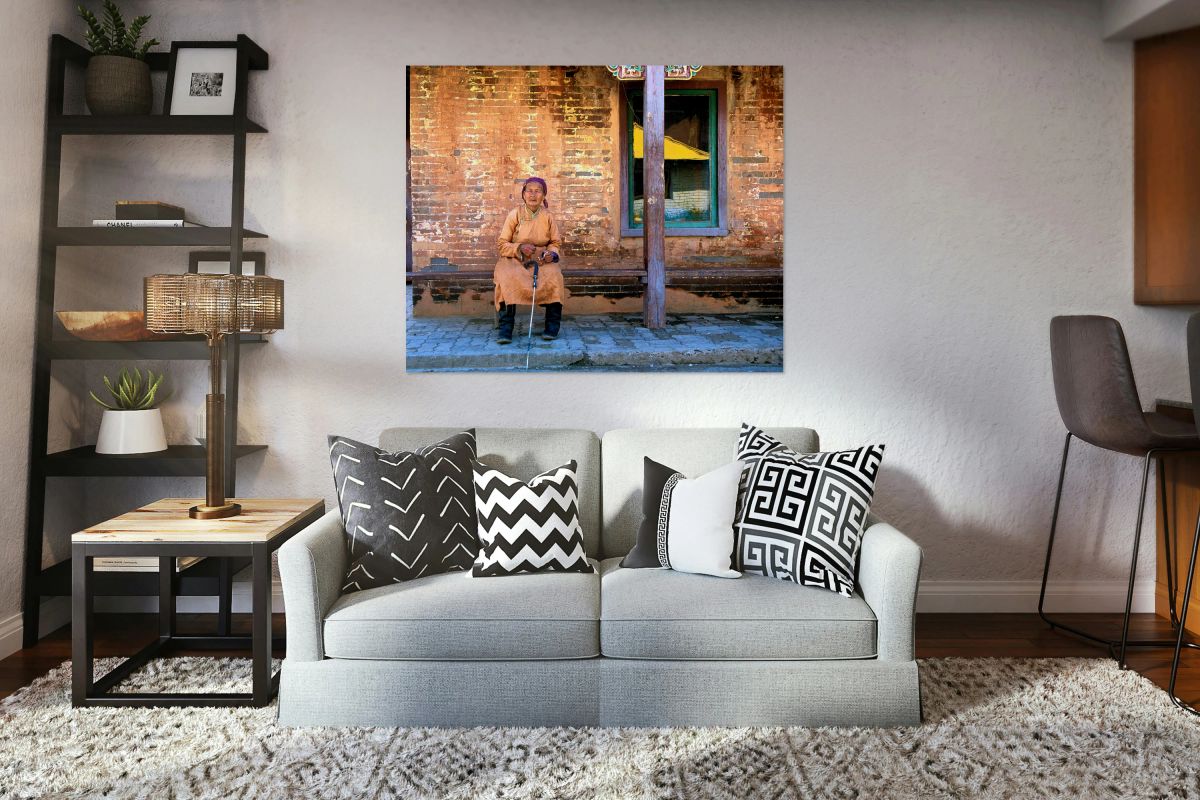 Old woman sits at Gandantegchinlen Monastery in Ulaanbaatar Mon