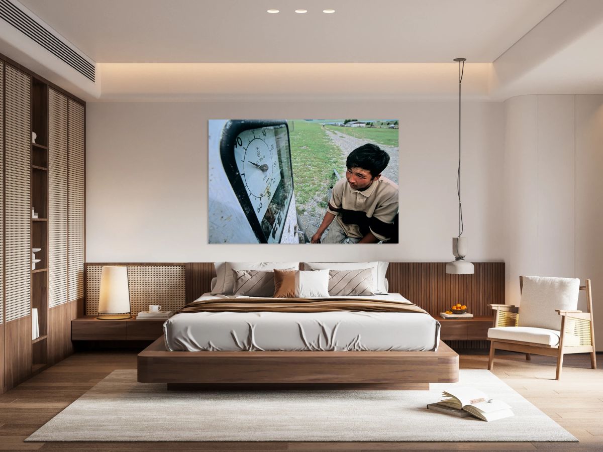 Vintage petrol station in Mongolia with a young man filling up