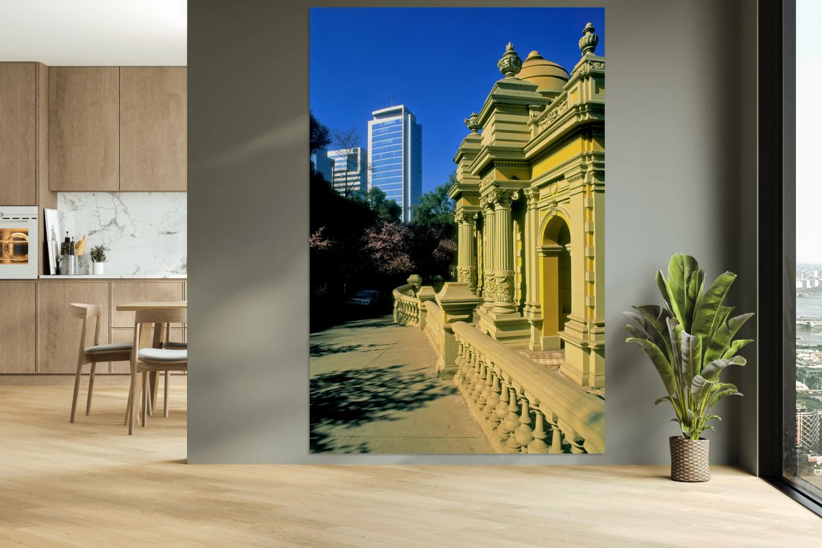 Historic architecture contrasts with modern high rise buildings.