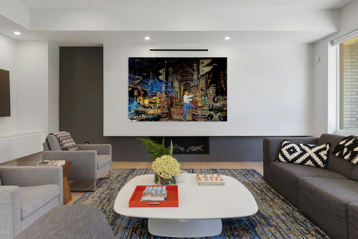 Boy interacts with religious artifacts in Kathmandu temple