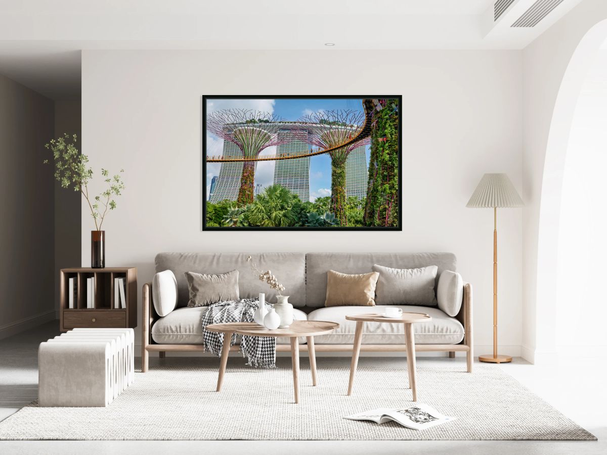 People walk on bridge connecting to Supertree Grove in Singapore