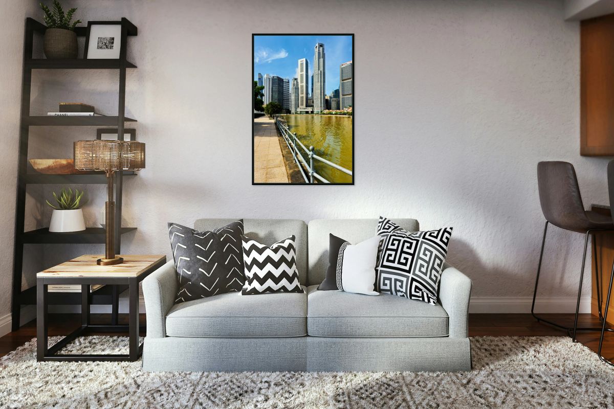 People walk along the canal in Singapore