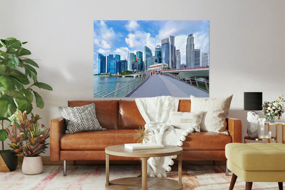 People stroll in Singapores financial district by a bridge