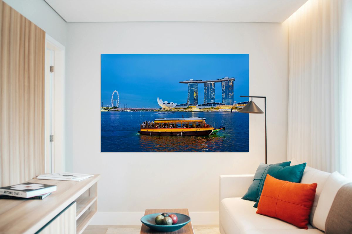 Sunset boat rides past Merlion and Marina Bay Sands