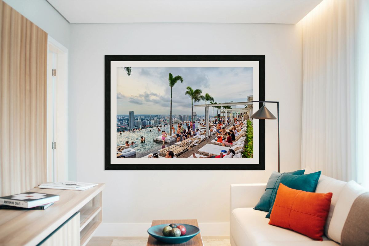 Visitors enjoy swimming in the infinity pool at Marina Bay Sands