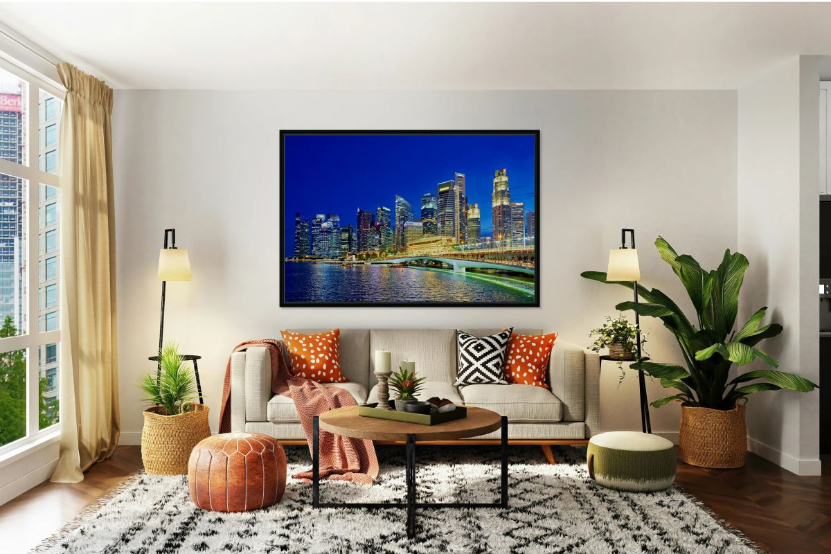 City skyline reflected on water at sunset in Marina Bay