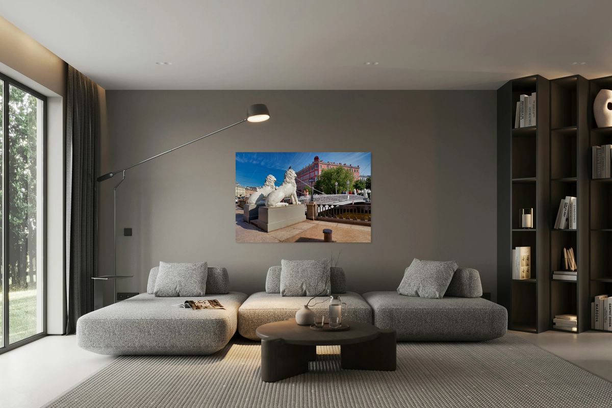 Lions guard the bridge in Saint Petersburg on a sunny day