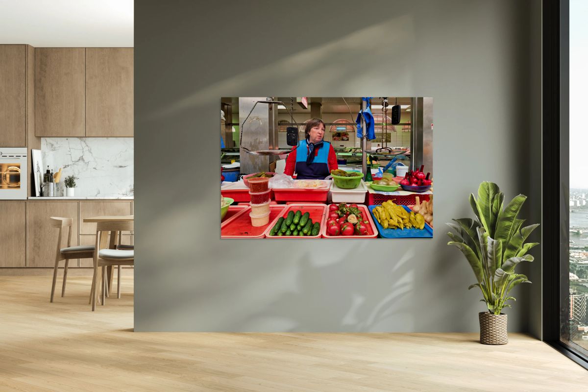 Vendor sells fresh produce at Kuznechnyy Rynok St. Pete