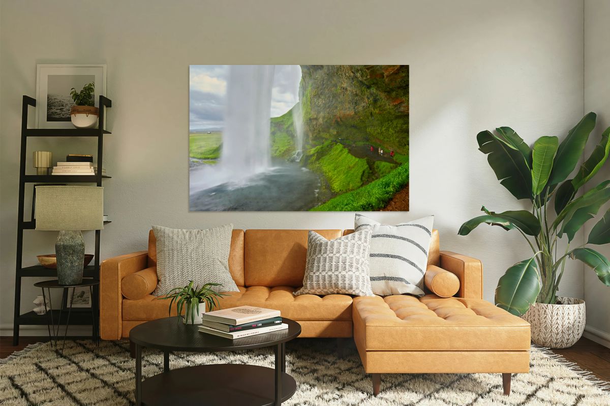 Seljalandsfoss waterfall view from behind in Iceland