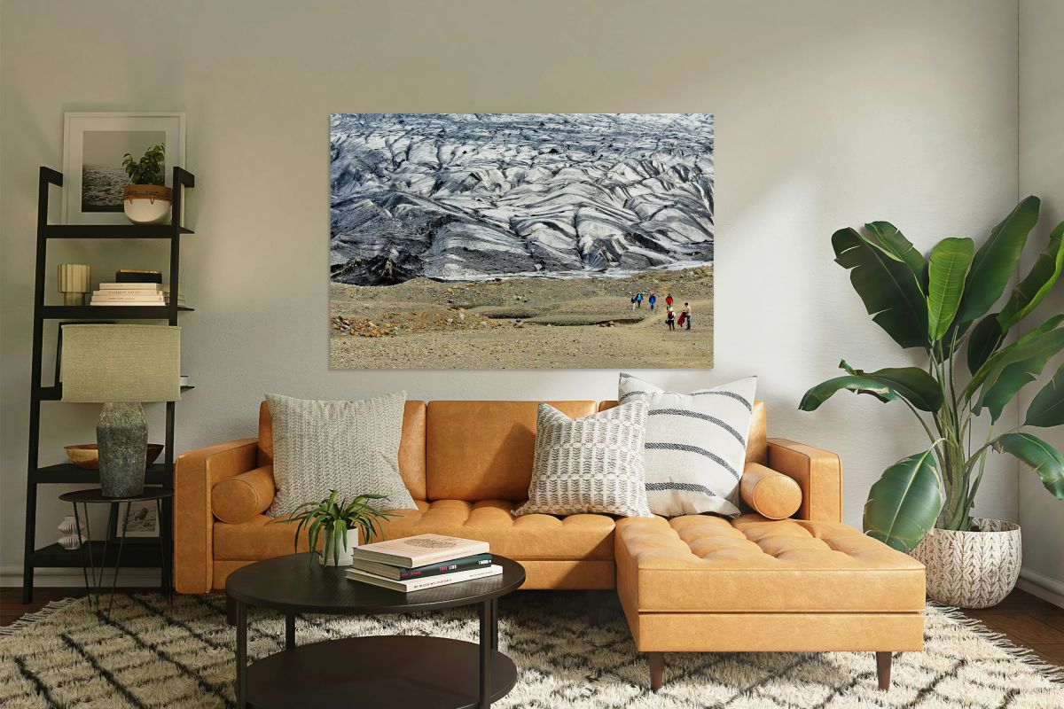 Visitors walk on Skaftafell Glacier in Iceland