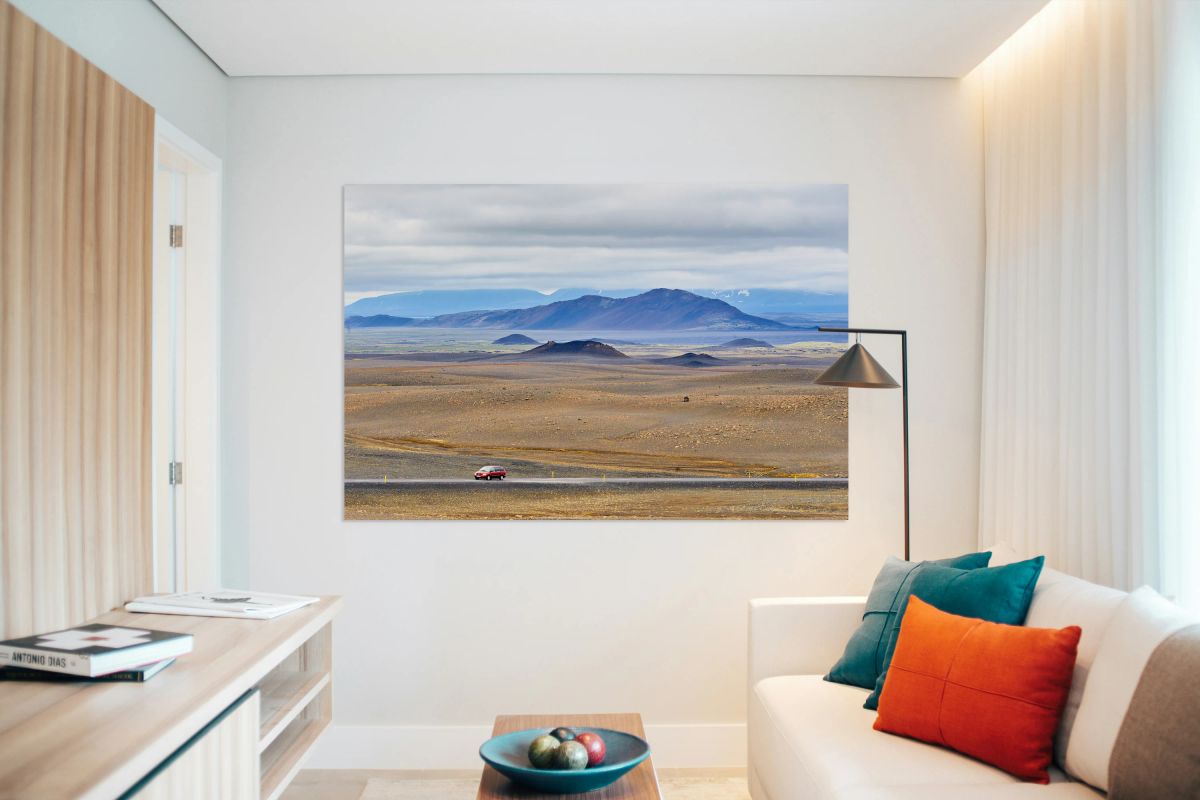 Car driving along Hringvegur road in Iceland landscape