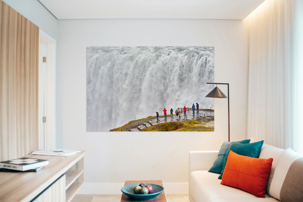 Waterfall view at Dettifoss in Iceland with visitors nearby